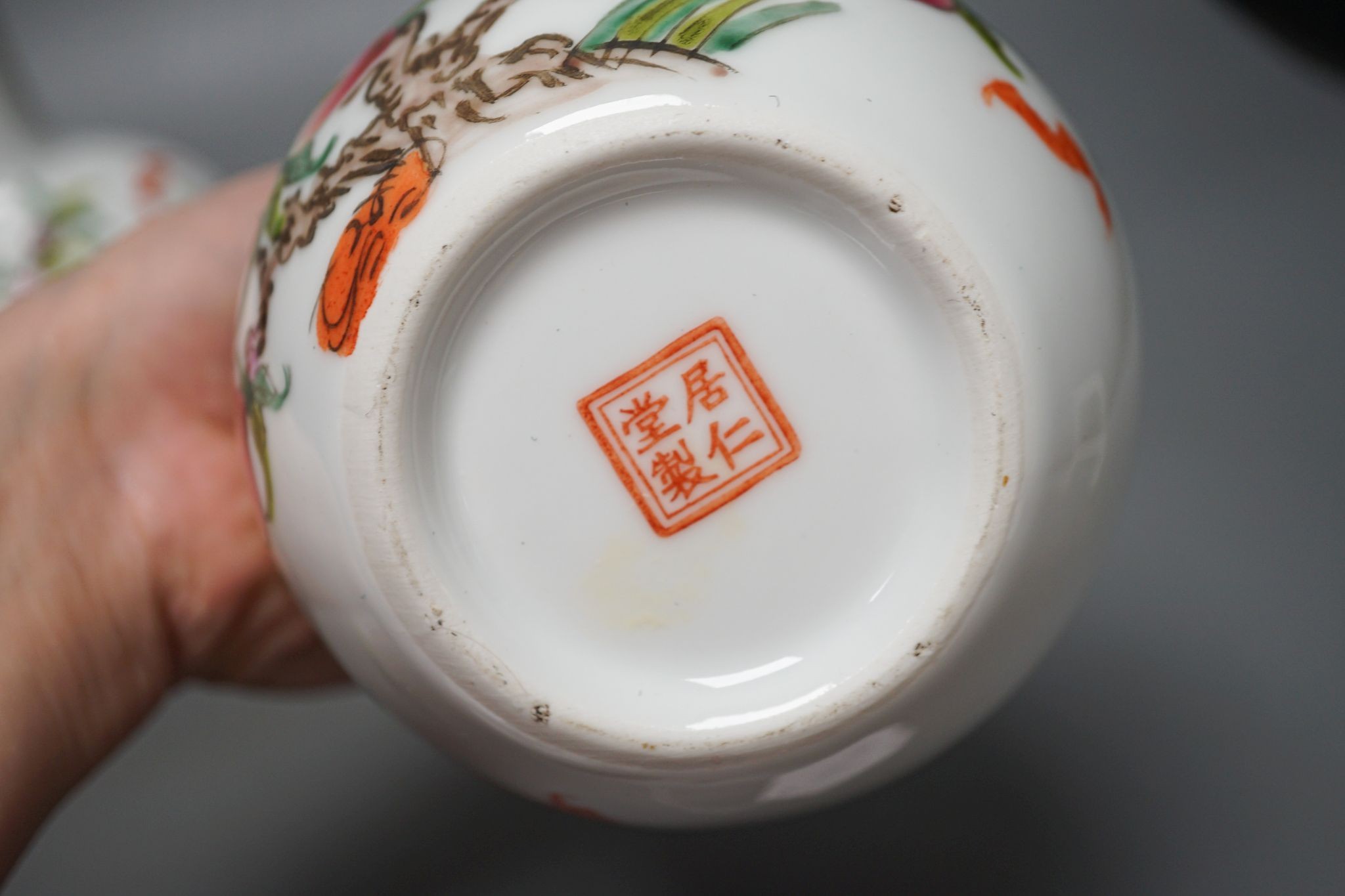 A pair of Chinese famille rose ‘peach’ bottle vases, 17cm, a ‘phoenix’ jar and cover, two porcelain cups and a boxed set of bamboo tallies or counters (6)